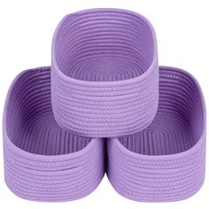 three purple baskets stacked on top of each other in the shape of four round baskets