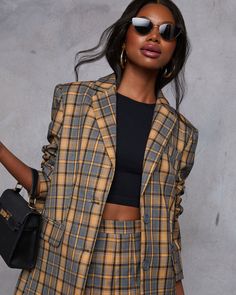 Meet your new fall favorite: the Siena Plaid Blazer. Crafted from sleek suiting fabric, this blazer features a polished front button closure and a chic collar for an effortlessly sophisticated look. Perfectly tailored for a flattering fit, it’s an ideal match for the pleated mini skirt (sold separately) for a coordinated ensemble that transitions seamlessly from day to night. Runs large, consider sizing down Suiting fabric Front button closure Buttoned cuffs Lined Shell: 68% Polyester 32% Rayon Double-breasted Blazer With Welt Pockets For Fall, Fall Office Suit With Suit Collar, Trendy Fall Blazer Dress With Lapel Collar, Tailored Fall Blazer Dress With Suit Collar, Tailored Notch Lapel Blazer Dress For Fall, Tailored Blazer Dress With Suit Collar For Fall, Trendy Fitted Button-up Blazer, Trendy Tailored Blazer With Button Closure, Trendy Fitted Double-breasted Blazer