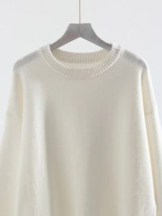 47380937277762|47380937310530|47380937343298 White Crew Neck Cropped Sweater, White Crew Neck Cropped Sweater For Fall, White Crew Neck Knit Top For Fall, Winter White Crew Neck Cropped Sweater For Winter, Winter White Crew Neck Cropped Sweater, Knitted Crew Neck Tops With Cozy Fit, White Knit Cropped Sweater With Ribbed Cuffs, Cozy Knitted Sweatshirt, White Oversized Knitted Sweatshirt