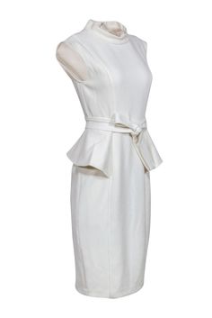 Sophisticated ivory dress in a figure flattering peplum silhouette. Take this dress to the next level by accessorizing it with a pair of dazzling statement earrings! Size 6 Shell: 63% Polyester, 33% Viscose, 4% Elastane Lining: 100% Polyester Stand collar neckline Concealed back seam zipper closure Sheath silhouette Sleeveless Peplum detail Bust 31" Waist 28" Shoulder to hem 43" Elegant Formal Peplum Midi Dress, Elegant Peplum Midi Dress For Party, Chic Peplum Midi Dress For Cocktail, Chic Evening Midi Dress With Peplum, Chic Peplum Midi Dress For Evening, Chic Evening Peplum Midi Dress, Elegant Peplum Evening Dress, Elegant Evening Peplum Dress, Chic Peplum Midi Dress For Work