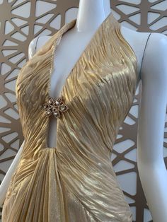 Luxury Gold Evening Dress With Fitted Bodice, Luxury Halter Neck Evening Dress For Gala, Luxury Halter Neck Gala Evening Dress, Luxury Gold Evening Dress For Prom, Gold Luxury Gown With Fitted Bodice, Gold Backless Gown For Prom, Elegant Evening Dress For Glamorous Events, Gold Gown With Fitted Bodice For Evening, Luxury Halter Neck Evening Dress For Wedding