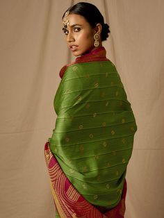 Pleasing maroon and green soft silk woven design saree online for women which is crafted from soft silk fabric and comes with soft silk blouse.Shop this stunning saree online at the best price in India. We do express shipping USA, UK, Canada and Worldwide. Green Cotton Silk Pre-draped Saree For Festivals, Green Pre-draped Saree With Traditional Drape, Green Cotton Silk Pre-draped Saree With Pallu, Green Pre-draped Cotton Silk Saree With Pallu, Festive Green Paithani Silk Pre-draped Saree, Festive Green Pre-draped Saree With Zari Weaving, Festive Green Cotton Silk Saree, Green Cotton Silk Blouse Piece With Traditional Drape, Green Paithani Silk Pre-draped Saree With Self Design