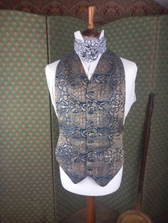 Antique 1952s men's waistcoat vest, harks back to a bygone era of sartorial elegance. Crafted with meticulous attention to detail, this garment reflects the sophistication and style of the early 20th century. Measurements: Pit to Pit (Chest): 16 inches Back Length: 26 inches Waistcoat Only, Decorative Items Not Included We're thrilled to present this unique vintage item, but please note that all other items you see in the images are purely for decorative purposes and are not included in the sale Classic Sleeveless Three-piece Suit For Wedding, Vintage Tailored Three-piece Suit For Formal Occasions, Vintage Three-piece Suit For Business, Classic Sleeveless Nehru Jacket For Formal Occasions, Vintage Fitted Three-piece Suit For Formal Occasions, Elegant Fitted Vest For Costume, Elegant Sleeveless Nehru Jacket For Formal Occasions, Vintage Fitted Three-piece Suit For Semi-formal Occasions, Fitted Vintage Three-piece Suit For Semi-formal Events