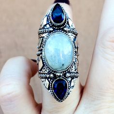 Brand New Handmade Rainbow Moonstone And Blue Topaz Silver Statement Ring. Size 8 925 Stamped New To Poshmark? Use Referral Code Kimberlyn222 To Receive $10. Silver Sterling Sapphire Ring With Natural Stones, Sterling Silver Sapphire Ring With Natural Stones, Silver Sapphire Ring With Natural Stones, Blue Moonstone Ring With Accent Stones, Silver Topaz Ring For Jewelry Making, Silver Labradorite Crystal Ring With Gemstone, Elegant Silver Sapphire Ring With Natural Stones, Silver Sterling Silver Crystal Ring With Gemstone Accents, Bohemian Sterling Silver Crystal Ring With Gemstone Accents