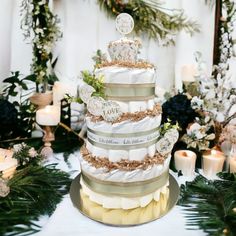 a multi layer cake sitting on top of a table