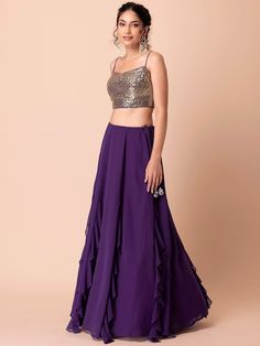 Introducing our charming purple georgette party wear lehenga with sequins choli, a stunning ensemble perfect for weddings, receptions, and parties. Crafted from high-quality georgette material, this lehenga features a beautiful purple color that exudes elegance and style.
The accompanying choli is adorned with sequin and embroidered detailing in a similar purple shade, adding a touch of glamour to the overall look. Made from georgette material as well, it ensures comfort and a flawless fit. To c Purple Georgette Pre-draped Saree For Evening, Wedding Georgette Floor-length Skirt, Festive Georgette Skirt For Reception, Floor-length Georgette Skirt For Wedding, Purple Floor-length Pre-draped Saree For Reception, Wedding Floor-length Georgette Skirt, Purple Bollywood Party Pre-draped Saree, Floor-length Georgette Party Skirt, Festive Reception Georgette Skirt