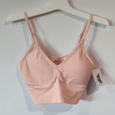 Pink Lightly Lined V-Neck Bralette By Auden. Size: 34c, 34d, 36b, 36c Spring Camisole Bra For Loungewear, Spring Loungewear Camisole Bra, Pink Bra-friendly Crop Top For Loungewear, Pink Bra Friendly Crop Top For Loungewear, Feminine Spring Loungewear Bra, Trendy Spring Loungewear Bra, Feminine Seamless Bra For Loungewear, Pink Stretch V-neck Bra, Pink Seamless Feminine Camisole