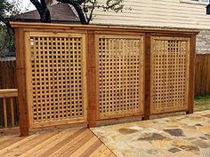 an image of a screen shot of a wooden fence with lattices on the sides