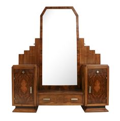 an art deco vanity with mirror and two nightstands on each side, all in wood