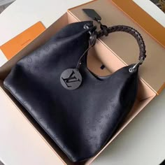 Louis Vuitton Carmel Mahina Leather Black Bag – Bags Alora Τσάντες Louis Vuitton, Tas Louis Vuitton, Tas Lv, Black Louis Vuitton, Tas Bahu, Beg Tangan, Lv Bags, Handbag Heaven, Black Leather Bags