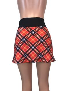 Step up your game in this fun and colorful athletic skirt with built in compression shorts and pocket. This golf, tennis, running or sports skirt is slim-style, but allows for plenty of movement, made of a red plaid high quality performance spandex. The compression shorts are uniquely designed to be incredibly comfortable and won't ride up during activity. The pocket is positioned on the side of the shorts, and will fit your phone, keys, ID, etc. *Please see size chart in images above for standa Running Skirt, Sports Skirt, Athletic Skirts, Running Skirts, Golf Skirt, Slim Skirt, Athletic Skirt, Slim Style, Tennis Skort