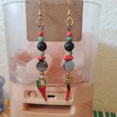 Handmade Multi Stone Beaded Chili Pepper Dangle Earrings So Cute. Smoke Pet Sick Free Home Comes With Abalone Shell Circle Beads. Abalone Shell Is Said To Enhance Feelings Of Peace, Compassion And Love. Comes With Black Lava Stone Beads. Lava Stone Is Know For Is Grounding And Calming Healing Properties. Comes With Matte Reconstituted Red Kynanite Stone Beads. Kyanite Will Push The Strength That's In Your Mind Down To Your Entire Body Which Will Lead To Eventual Balance Within Yourself. Comes Wi Casual Multicolor Dangle Jewelry, Nickel-free Casual Beaded Earrings For Gift, Nickel Free Casual Beaded Earrings For Gift, Casual Nickel-free Beaded Earrings As Gift, Casual Nickel-free Beaded Earrings For Gift, Casual Beaded Dangle Jewelry, Casual Black Dangle Jewelry, Casual Dangling Beads Jewelry As Gift, Casual Handmade Beaded Dangle Earrings