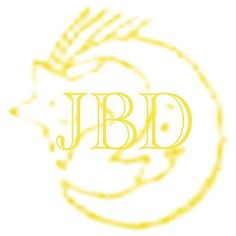 the j b d logo is shown in gold on a white background with an arrow