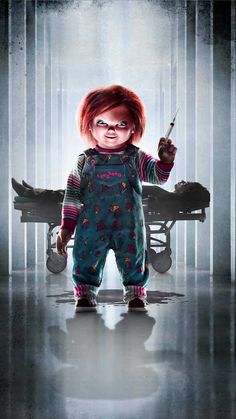 the chucky doll is holding a knife in his hand