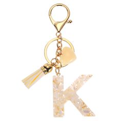 Document The exquisite letter charm keychain has a wide range of uses and can be used as a key ring, bag decoration, backpack accessories, gifts, decorations, and even fashion accessories. Suitable for backpacks, wallets, car keychains, mobile phone cases, bag charm, etc.SpecificationColor: BeigeMaterial: Alloy, ResinTotal Length: 10.9 cm / 4.29 inchWidth: 4 cm / 1.57 inchPackage List: 1 Pcs x Initial Charm KeychainAdvantageThis cute letter keychain comes with tassels and heart-shaped pendants a Cute Keyrings, K Keychain, 13th Bday Ideas, Resin Letters, Keychain Resin, Key Purse, Cute Letter, Letter Keychain, Cute Keychains