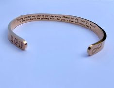 "This listing features ONE stainless steel silver, gold, or rose gold cuff bracelet for your daughter or daughter in law. The outside of the bracelet will come with the bride and groom's names or a monogram, in the script font shown, along with a date on one end and a heart or Love infinity symbol on the other end. The inside of the bracelet will come with a message, personalized if desired. -->Today God blessed my son with a wife, and me a daughter and friend for life -->Today a Bride, To Mother's Day Wedding Engraved Heart Bracelet, Engraved Adjustable Cuff Bracelet For Wedding, Heart-shaped Engraved Bracelets For Wedding, Heart-shaped Engraved Wedding Bracelets, Daughter In Law Bracelet, Personalized Cuff Bracelets, Rose Gold Cuff Bracelet, Daughter Wedding Gifts, Wedding Gift For Bride