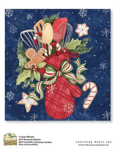 a christmas stocking filled with cookies and candy canes on top of a blue background