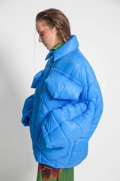 Unisex quilted jacket "Lupinus Light Blue" features a round shoulder and oversized fit for a relaxed, comfortable feel. It's made from lightweight, wrinkle-free polyester and has large pockets, windproof, and water repellent properties. The soft, bold shape makes it a statement piece, and the hypoallergenic synthetic padding adds warmth without compromising style.Size Guide:ONE SIZE (fits to XS-XL)Collar - 51 cmWides middle line - 170 cmBottom line - 140 cmSleeve ends - 57 cmLength from the neck Oversized Nylon Puffer Jacket With Pockets, Oversized Solid Nylon Windbreaker, Oversized Nylon Windbreaker In Solid Color, Oversized Quilted Nylon Outerwear, Oversized Quilted Long Sleeve Jacket, Oversized Outdoor Puffer Jacket With Pockets, Oversized Puffer Jacket With Pockets For Outdoor, Spring Nylon Quilted Jacket With Pockets, Oversized Quilted Outerwear For Cold Weather