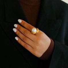 Indulge in timeless elegance with our Vintage Floral Orb Round Baroque Pearl Rings. Featuring a delicate floral design and lustrous baroque pearls, these rings add a touch of vintage charm and sophistication to any outfit. Metal: 18K Recycled Gold Plated On Brass Gemstone:Freshwater Baroque Pearl Ring Dimensions: Height 20mm Fits Ring Sizes: US 6-8 Weight:17g Rings Pearl, Pearl Rings, Edison Pearls, Open Rings, Flower Ball, Recycled Gold, Pearl Size, Baroque Pearls, Pearl Ring