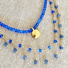 Tiny beads necklace rosary style with either blue chalcedony or sapphire. Length Blue Chalcedony 18" Length Sapphire 19" Blue Sapphire crystals have an excellent energy within the throat chakra to aid your communication ability. Blue chalcedony energies mainly focus on your throat and enables you to speak freely. -This information is intended for spiritual support only Chalcedony beads 3mm Sapphire 3-3.5mm Wire & Findings 14K GF Blue Faceted Round Bead Crystal Necklace, Adjustable Faceted Blue Crystal Necklace, Blue Faceted Crystal Necklace With Round Beads, Blue Faceted Round Bead Necklaces, Blue Faceted Necklaces With Round Beads, Blue Double Strand Necklace With Faceted Beads, Blue Necklaces With Faceted Round Beads, Blue Faceted Lapis Lazuli Beaded Necklaces, Blue Faceted Beads Double Strand Jewelry