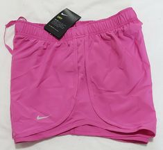 New Nike Women's running Dry Tempo Shorts 831558-662 medium size  Get images that make Supersized seem small. THE simple solution for eBay sellers. Track Page Views With Auctiva's FREE Counter Nike Stretch Athletic Shorts For Jogging, Nike Stretch Shorts For Running Errands, Nike Stretch Shorts For Casual Wear, Pink Athletic Shorts For Jogging, Pink Stretch Athletic Shorts For Running, Pink Short Activewear For Jogging, Pink Sportswear Shorts For Jogging, Pink Casual Shorts For Running Errands, Casual Pink Bottoms For Running Errands