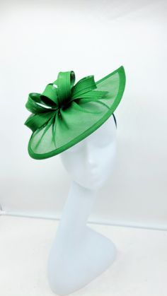 Green Wedding Fascinator. Beautiful headpiece for bridesmaids and a great accessory for a cocktail party or church outfit.  Comes with a pin or headband for an elegant but secure look. - Headband and hairclip  - Ready to ship  - Lightweight - Free Shipping - Fast shipping - Customize by adding different color flowers and or feathers Check my store for styles and colors.  Hatsandpearls.etsy.com Find more at my website: Www.hatsandpearls.com  Reach out to me if you can't find what you are looking for.  I can make cake custom orders and help you style and match your outfit  Tag and share your pictures when you wear and style our hats.  Instagram: @hats_pearls Facebook: Hats Pearls Thank you for visiting and happy shopping! Luxury Green Fascinator For Formal Occasions, Luxury Green Costume Hats And Headpieces For Women, Luxury Curved Brim Green Headpiece, Fitted Green Costume Hats And Headpieces For Wedding, Green Fitted Costume Hat For Wedding, Elegant Green Headpiece For Church, Elegant Green Fascinator For Church, Elegant Green Wedding Costume Hats And Headpieces, Elegant Green Top Hat For Party