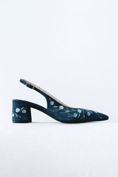 Wedding slingback pumps 'Tati' are handcrafted from navy blue Italian suede. The pair of bridal heels features handmade floral embroidery with flowers and vines that can be customized to your preference.  This design also has pointy toes and a 5.5 cm / 2.2 inches stable block heel. The heel also has the embroidery on all sides in the same pattern. These wedding shoes are designed with a V-notched vamp (v-cut) and closed toe which makes bridal sandals even more elegant and special. Take note that Evening Heels With Floral Embroidery And Pointed Toe, Elegant Formal Heels With Floral Embroidery, Elegant Floral Embroidered Heels For Formal Occasions, Elegant Floral Embroidery Heels For Formal Occasions, Formal Heels With Floral Embroidery And Ankle Strap, Formal Floral Embroidered Ankle Strap Heels, Stable Block, Wedding Pumps, Bridal Sandals