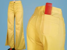 "Just in time for Spring! Check out these 1970s mid rise pants with extreme wide legs, a curvy fit, & most beautiful faintly streak-dyed canary melon yellow on an extraordinarily soft brushed cotton twill. There's a Talon zip fly with a branded snap closure, 2 large patch pockets on the hips with cute barn door stitching, & 2 of the same in back. There are no belt loops or back yoke, but there are 2 vertical darts in back that make for a slimming fit. LABELS ● SIZING ● FABRIC The interior brand Playful Cheap Yellow Bottoms, 1970s Wide Leg Spring Jeans, 1970s Style Wide Leg Spring Jeans, 1970s Wide Leg Jeans For Spring, Vintage Flare Cotton Pants, Retro Cotton Wide Leg Full Length Pants, 70s Inspired Cotton Wide Leg Pants, Vintage Wide Leg Yellow Pants, 70s Inspired Wide Leg Cotton Pants