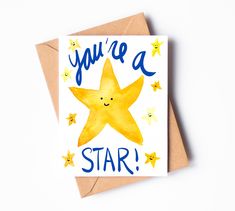 you're a star greeting card with watercolor stars on the front and bottom