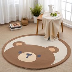 a teddy bear rug in the corner of a room with a table and potted plant