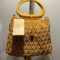 This Is A Stunning Hobo Bag With Leather Handles And A Long Chain For Crossbody Wear. Brand New With Tag. It Is Crocheted With A Soft Material On The Inside. Comes With Dust Bag. Pictures Show Sizing. Casual Yellow Crochet Woven Bag, Casual Yellow Crochet Bag With Braided Handles, Yellow Top Handle Shoulder Bag With Braided Handles, Chic Yellow Crochet Bag For Daily Use, Chic Yellow Crochet Bag, Yellow Top Handle Bucket Bag For Travel, Chic Yellow Crochet Tote Bag, Yellow Woven Shoulder Bag With Double Handle, Yellow Top Handle Straw Bag For Shopping