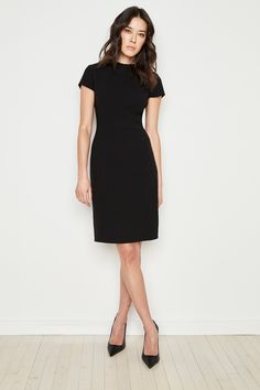 DescriptionOur take on the season's must have body con dress. Our fluid crepe delivers this body skimming silhouette with its sculptured dart neckline. Fabric70% Triacetate, 30% PolyesterCareDry Clean OnlyStyle #: EU88761U Fitted Elastane Sheath Bodycon Dress, Knee-length Elastane Bodycon Dress, Tailored Structured Black Dress, Flattering Silhouette Bodycon Dress, Formal Fitted Elastane Bodycon Dress, Sleek Fitted Sheath Midi Dress, Fitted Sleek Sheath Midi Dress, Fitted Elastane Bodycon Dress For Formal Occasions, Classic Midi Length Elastane Dresses