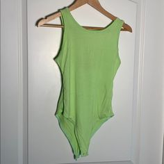 Neon Green/Yellow Striped Bodysuit. Never Worn. Good Condition. Very Cute And Comfortable. Green Sleeveless Bodysuit For Spring, Sleeveless Green Bodysuit For Spring, Casual Green Stretch Bodysuit, Spring Green Bodysuit, Green Cotton Bodysuit For Spring, Green Cotton Bodysuit For Loungewear, Trendy Green Stretch Bodysuit, Green Stretch Bodysuit For Spring, Fitted Green Bodysuit For Summer