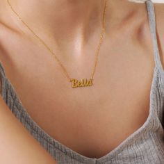 What sets this necklace apart is its customizable feature. With the option to personalize it with your name, the name of a loved one, or a special word of significance, this Gold Custom Name Necklace becomes a meaningful and heartfelt keepsake. Product Details of the Gold Custom Name Necklace: Material: Choose Material 14K Solid Gold or 14K Gold Plated Choice of Gold Color: Yellow Gold, Rose Gold, White Gold Closure: Spring ring Chain style: Cable Style: Minimalist Adjustable Length Please choos Gold Custom Name Necklace For Her, Elegant Yellow Gold Jewelry With Names, 14k Gold Custom Name Necklace, Customized Dainty Yellow Gold Jewelry, Elegant Gold Custom Necklace With Names, Elegant Custom Gold Necklace With Names, Elegant 14k Gold Jewelry With Names, 14k Gold Name Necklaces For Weddings, Yellow Gold Custom Name Jewelry As Gift For Her