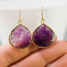 "Beautiful bezel set Natural Purple Amethyst drop Earrings. ✦Gemstone: Purple Amethyst (*this stone has natural internal cracks and inclusions) ✦Stone Size: ~ 20mm x 20mm (0.75\" x 0.75\") ✦Earring Length: ~35mm (1.5\") ✦Bezel Metal: 18K Gold Vermeil (18K Gold plated 925 Sterling Silver) ✦Hook Metal: 14K Gold Filled ✦Because we use natural stones, the stones may vary slightly in shape, size and color. **ALSO AVAILABLE IN STERLING SILVER** Please view my full collection of ✦ EARRINGS ✦: http://ww Teardrop Crystal Earrings Gift, Teardrop Crystal Earrings For Pierced Ears Gift, Amethyst Earrings For Gift, Purple Earrings With Ear Wire For Anniversary, Purple Hook Earrings For Anniversary, Purple Anniversary Earrings With Ear Wire, Purple Crystal Earrings With Ear Wire As Gift, Purple Crystal Earrings Matching Set For Gift, Purple Crystal Earrings For Gift