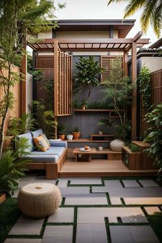 an outdoor living area with plants and furniture