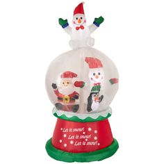 an inflatable christmas snow globe with santa claus and penguins on it's top