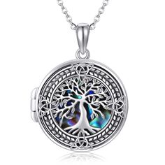 PRICES MAY VARY. 🌲 Design:Tree of life symbol of good luck,health,growth and strength.The tree of life locket inlay with abalone shell, mysterious, elegant and charming.A unique jewelry gifts to give someone you love. 🌲 Material :925 sterling silver celtic knot tree locket necklace with abalone shell, vintage,classic. Lead-Free & Nickel-Free, Hypoallergenic and safety for sensitive skin. 🌲 Size :Tree of Life photo locket pendant:0.78inch(20mm). Chain length: 18"+2 inch extension chain. packag Celtic Knot Tree, Vintage Locket Necklace, Shell Tree, Sterling Silver Locket Necklace, Locket Necklace Vintage, Tree Of Life Symbol, Silver Locket Necklace, Picture Locket, Sterling Silver Locket