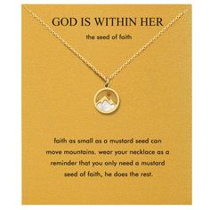 a gold necklace with the words, god is within her and a mountain on it