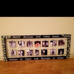 a wooden frame with pictures and words on it