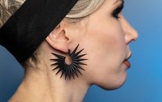 "\"Transpire Earrings\" Black spike earrings with a retro punk vibe to them. Part of \"Dark Matter,\" Hypnovamp's 3d printed jewelry collection.  Total Length: 1.9\" Width: 2.1\" Weight: 3 grams apiece (a US penny weighs 2.5 grams) Also available in blue: https://www.etsy.com/listing/837847923/bright-blue-spiky-earrings-geometric THE MATERIAL:  These earrings are made of black polyamide, a strong solid material created through the process of 3d printing. The surface is matte with a slight grain Trendy Black Pierced Hoop Earrings, Modern Black Handmade Hoop Earrings, Modern Handmade Black Hoop Earrings, Edgy Black Hoop Earring (single), Edgy Black Single Hoop Earring, Black Punk Hoop Earrings, Punk Style Black Hoop Earrings, Edgy Black Pierced Hoop Earrings, Edgy Black Adjustable Earrings