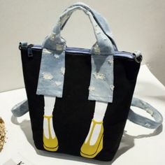 Casual Black Satchel, Black Double Handle Bucket Bag With Zipper, Trendy Black Canvas Satchel Bag, Black Crossbody Canvas Bag With Zipper Closure, Casual Satchel Backpack For Shopping, Casual Black Bags With Handles, Casual Black Bag With Detachable Handle, Black Canvas Satchel Bag, Black Tote Canvas Bag With Detachable Strap