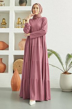 This pleated maxi dress combines modest elegance with versatility. Crafted from lightweight, breathable mixed fabric, it features tiered pleats that drape gracefully, making it a suitable choice for any season and an ideal option for warm spring days. The dress is beautifully crafted so that it looks great on all body types. Length and Fabric Content: Available Size: 38 - 40 - 42 - 44-46 Dimensions of the Product Model: Size: 38 cm Height: 144 cm Bust: 112cm Waist: 148cm Hips: 152 cm Special Not Ribbed Jacket, Peach Puff, Red Peach, Maxi Dress Sale, Warm Spring, Pleated Maxi Dress, Pleated Maxi, Tiered Maxi Dress, Red Fox