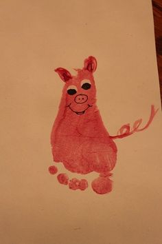 a child's drawing of a pig on a piece of paper with the word love written in it