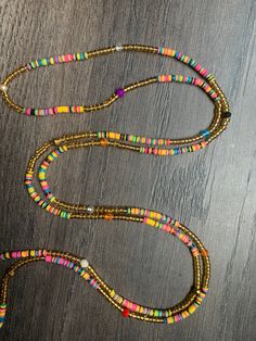 These beads come in TIE ON only, they are 45" long and self adjustable based on your waist size. ★ The listed prices are for one strand each. For multiple strands you'll have to indicate from the quantity section in your cart. Uses of Waist beads ★ Cultural and Spiritual Reasons ★Waist beads as ornaments as well as for symbolic adornment, ★ which serves as a sign of wealth, femininity or aristocracy, as well as spiritual well-being. ★ Weight-loss Management ★Self Love/ Confidence ​ Vinyl Waist Beads, Waist Beads Inspiration, Waist Bead Designs, Adjustable Multicolor Beaded Chain Waist Beads, Adjustable Strand Necklace With Beaded Chain, Adjustable Beaded Chain Long Necklace For Beach, Adjustable Multicolor Waist Beads For Festival, Adjustable Beaded Long Necklace For Beach, Adjustable Beaded Gold Long Necklace