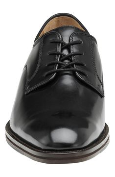 A high-sheen finish updates a smart plain-toe derby expertly welted to a lightweight leather sole. Leather upper, lining and sole Imported Formal Plain Toe Derby With Leather Footbed, Classic Snip Toe Oxfords For Derby, Formal Oxfords With Leather Footbed And Plain Toe, Fitted Derby With Rubber Sole For Business Casual, Classic Fitted Plain Toe Lace-up Shoes, Classic Fitted Lace-up Shoes With Plain Toe, Fitted Lace-up Shoes With Leather Lining, Classic Derby Shoes With Branded Insole And Plain Toe, Classic Derby For Business Casual With Branded Insole