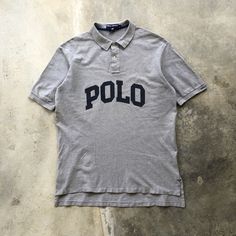 POLO SPORT By Ralph Lauren Spellout Polo Shirt TAG : Polo Sport SIZE : Large MEASUREMENT , - Width (Armpit to armpit) : 23.5" - Length (Shoulder the end of garment) : 32.5"Front 35"Back - Shoulder : 21.5" CONDITION : Perfect wear, no holes and stains SHIPPING, all item will be shipped with tracking number. Item received within 14-21 working days. Sporty Collared Polo Shirt With Logo Print, Classic Polo Shirt With Logo Print For Streetwear, Sporty Polo Shirt With Letter Print, Sporty Collared Polo Shirt With Letter Print, Sporty Polo Collar T-shirt With Relaxed Fit, Casual Polo Shirt With Letter Print And Polo Collar, Casual Polo Shirt With Letter Print, Sporty Cotton Polo Shirt With Logo Print, Letter Print Polo Shirt For Streetwear