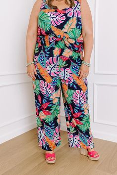 - Break away from the everyday and step into tropical style with these adorable high waist pants! Whether you are posing under the palms in a beachside paradise or simply adding a splash of the tropics to your casual summer style, these cuties have you covered. Embrace a laid-back island vibe with every step in these fabulous pants. - Unlined lightweight material with a pink, purple, green, and orange hued tropical botanical print - A high stretchy smocked waistband - Functional side pockets - A Tropical Botanical, The Palms, Island Vibes, High Waist Pants, Tropical Style, Summer Style Casual, Botanical Print, Waist Pants, Purple Green