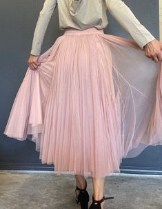 pink tulle skirt wedding party vocation skirt size M  Details :  Color: pink Size: M  Elastic waist  Material: Tulle lining inside  Measurements: *Waist: 12 inches across lay flat ( 24 inches around); can stretch to 19 inches wide (38 inches around). *Skirt length: 32 inches long Weight:  Appropriate 1 lb 5oz Care: Hand wash/Dry clean * Model's height is 5'7'' and waist is 28 inches, and is wearing size M  ---------------------------------------- Pleated Tulle Party Bottoms, Elegant Pink Prom Skirt, Spring Party Tulle Skirt Fabric, Feminine Pink Maxi Skirt For Party, Pink Feminine Evening Skirt, Spring Party Full Tulle Skirt, Pink Evening Skirt For Summer, Spring Pleated Tulle Bottoms, Spring Party Tulle Skirt