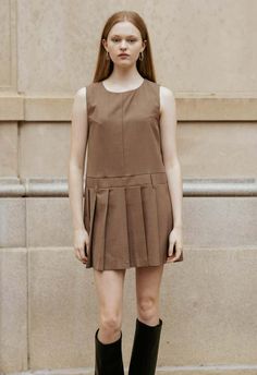 One size. fits xs-m  color: brown  jumper style mini dress  can be worn on top of a blouse  pleated bottom  belt loops at waist  invisible zipper down back center  100% polyester  dry clean  by the nkc store    product measurements:  bust: 116.84cm / 46in  length: 81.28cm / 32in    model is 177cm / 5'10" wearing size o/s Brown Jumper, Jumper Style, Easy Tiger, Lk Bennett, Sale Store, Dress Store, Mary Jane Heels, Inner Child, Bandeau Top